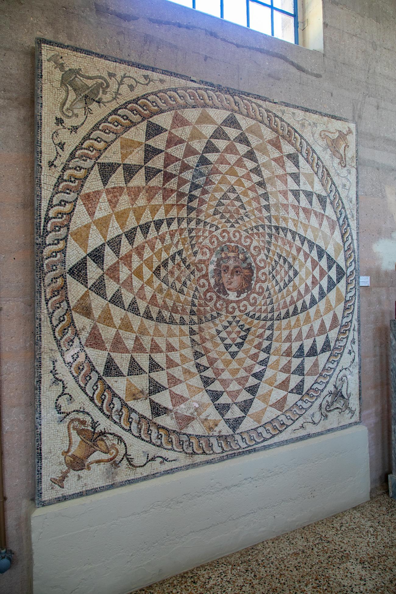 Central panel from tessellated floor of a Roman Villa with the head of Dionysus in the center - 2nd half of the 2nd c. - 3rd c. A.C.