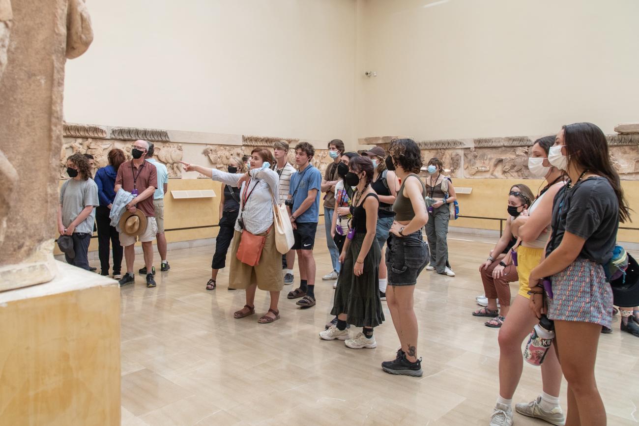 Students listening to our guide, Alice, at the Delphi Archaeological Museum